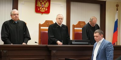 Judges of the Supreme Court of Russia Aleksey Shamov, Sergey Zelenin and Vasiliy Zykin after the announcement of the ruling in the case of Jehovah’s Witnesses from Kamchatka (December 2022)